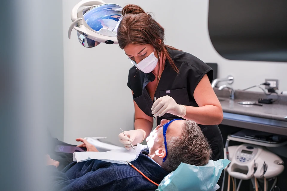 Dental team caring for a patient