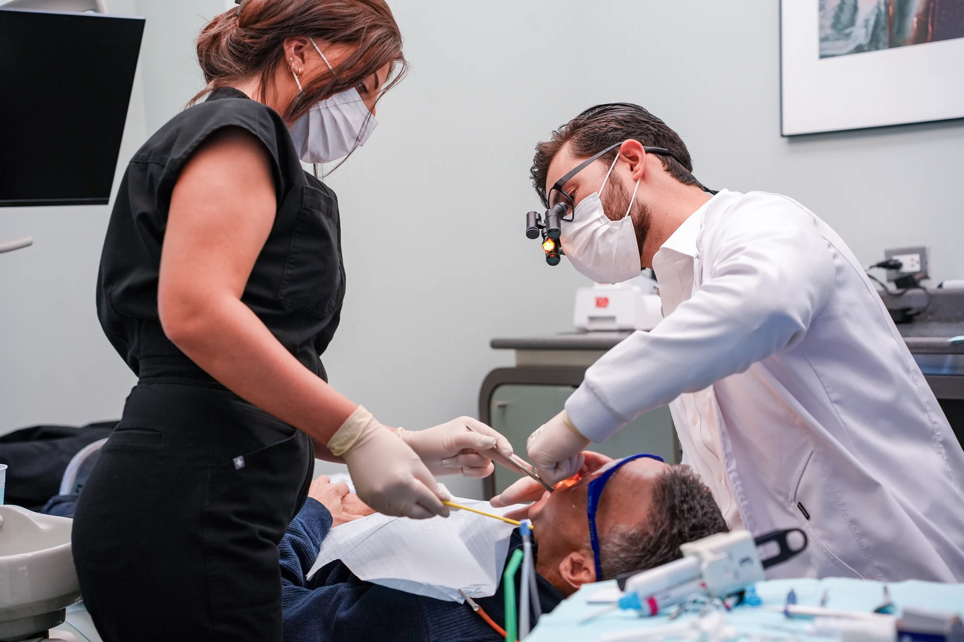Dental team treating a patient