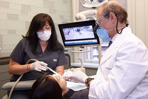 Dental team treating a patient