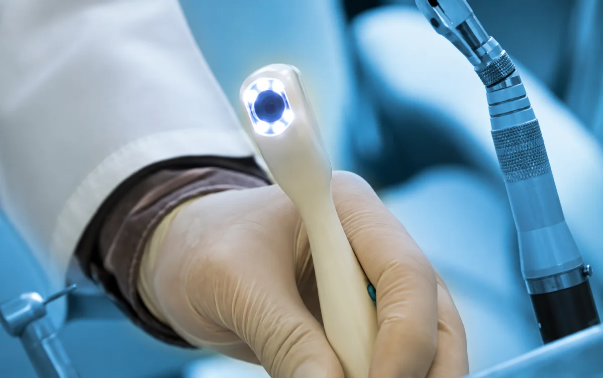 Soft-tissue dental laser handpiece in use